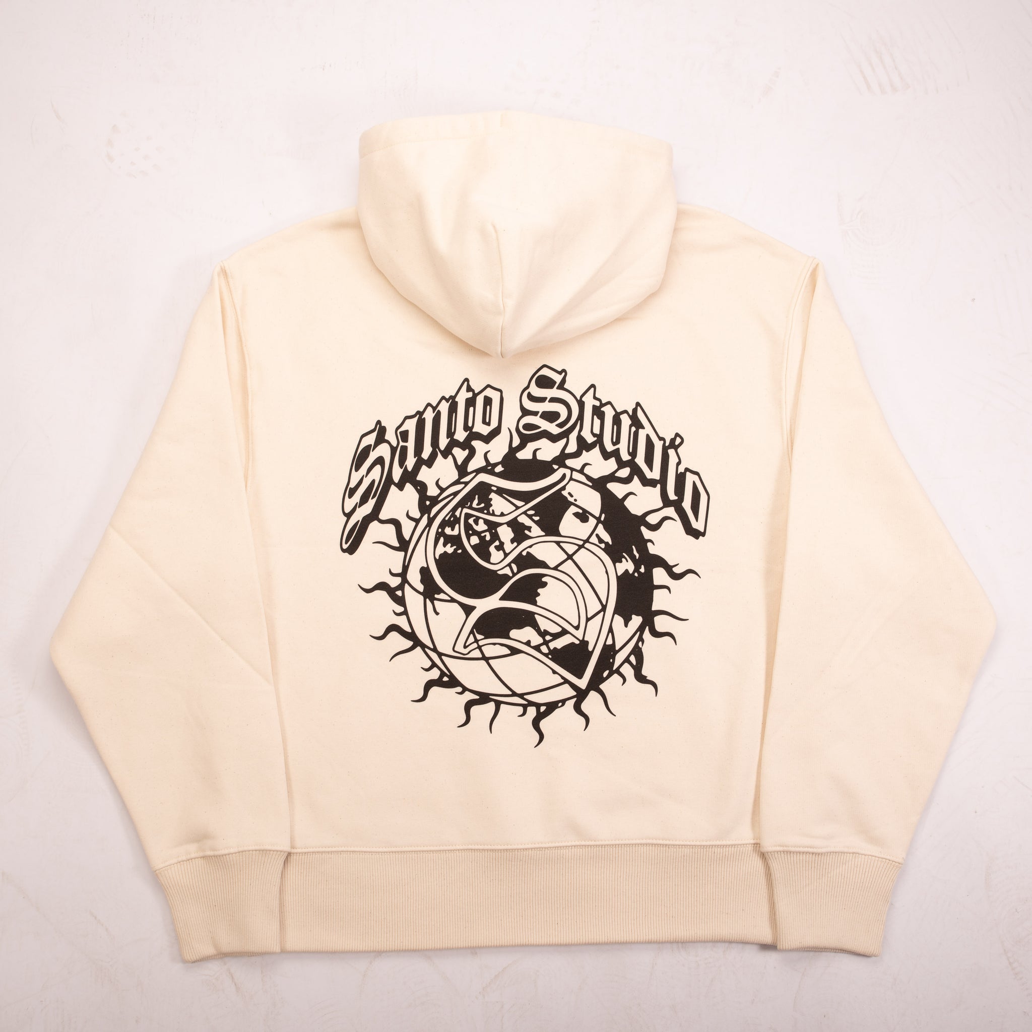 “THE WORLD IS YOURS” HOODIE CREAM